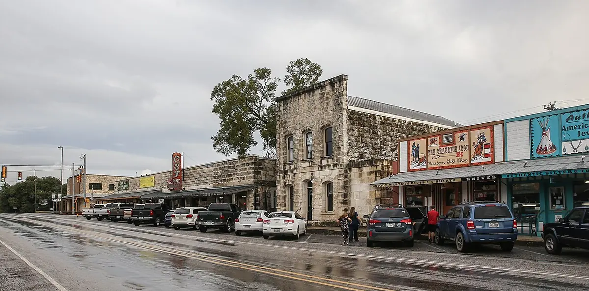 Limestone storefronts along Main Street in downtown Bandera, Texas